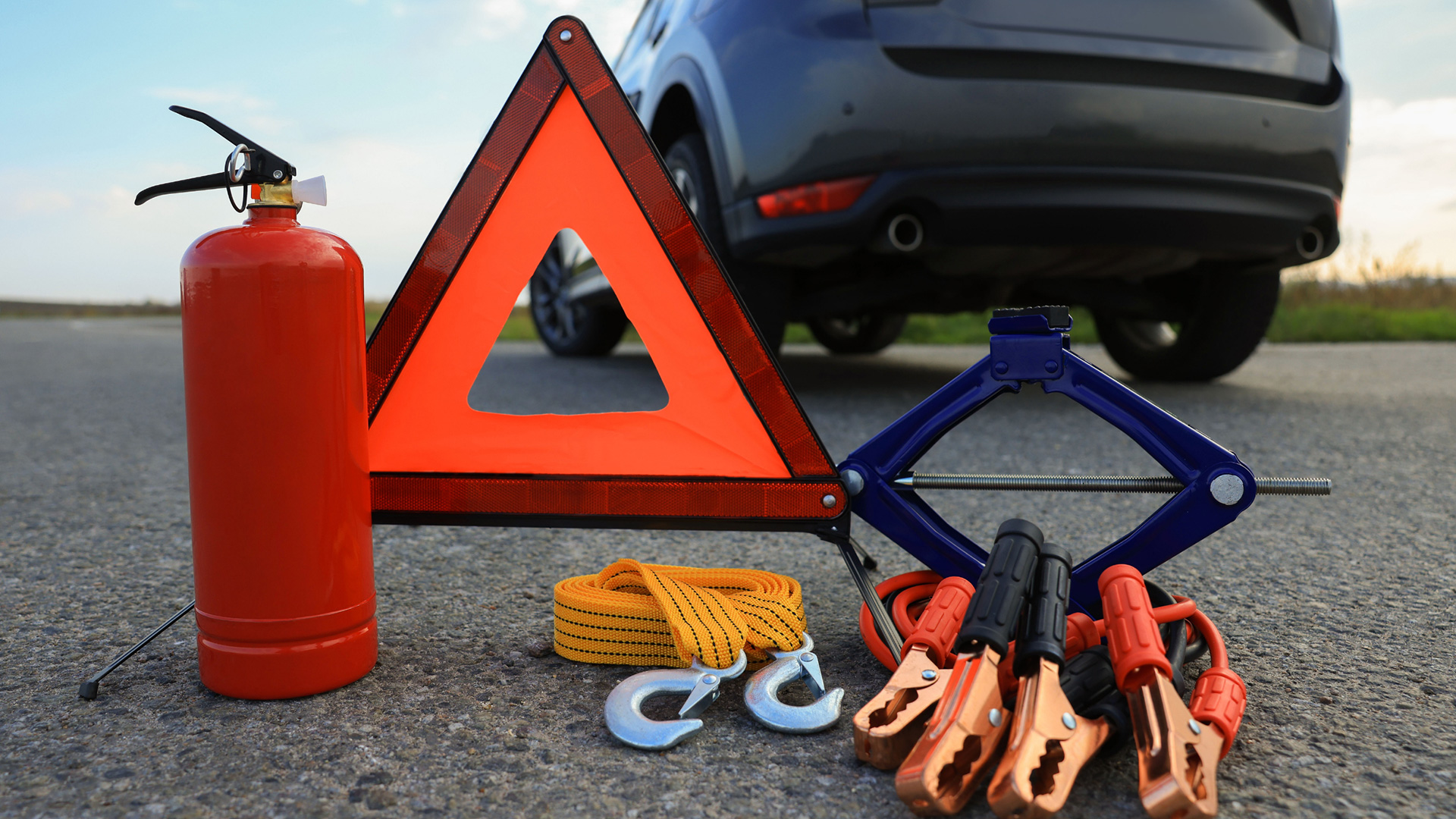 Mechanic servicing car at home in Hamilton